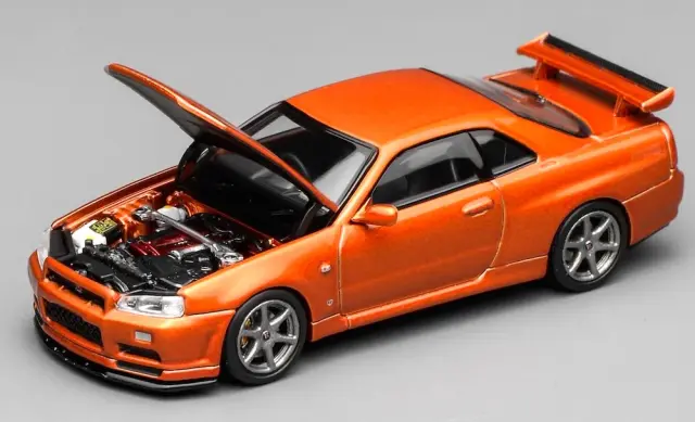 [予約] モーターヘリックス 1/64 ニッサン スカイライン GT-R R34 Vスペック2 カスタム メタオレンジ　M63471