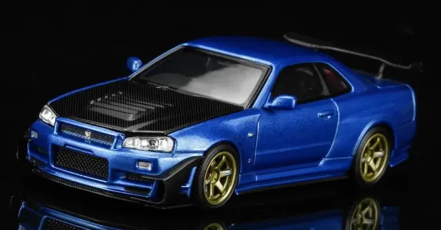 [予約] モーターヘリックス 1/64 ニッサン スカイラインGT-R (R34) カスタム ベイサイドブルー GTエアロキット装着車　M63476