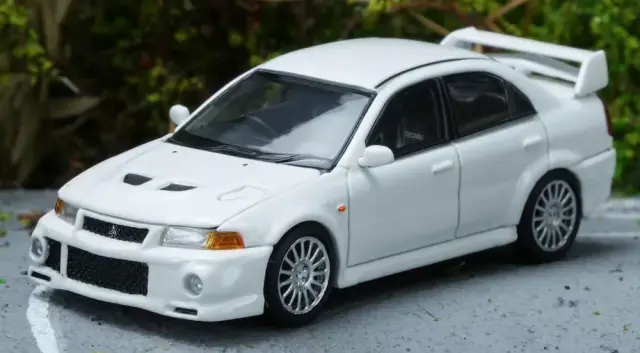 [予約] モーターヘリックス 1/64 ミツビシ ランサーエボリューションVI GSR スコシア ホワイト　M64203