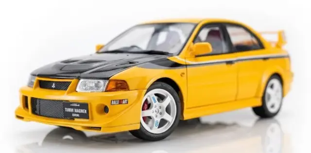 [予約] モーターヘリックス 1/18 ミツビシ ランサーエボリューション 6 GSR T.M.E カスタムイエロー（カーボンボンネット仕様）　M84306