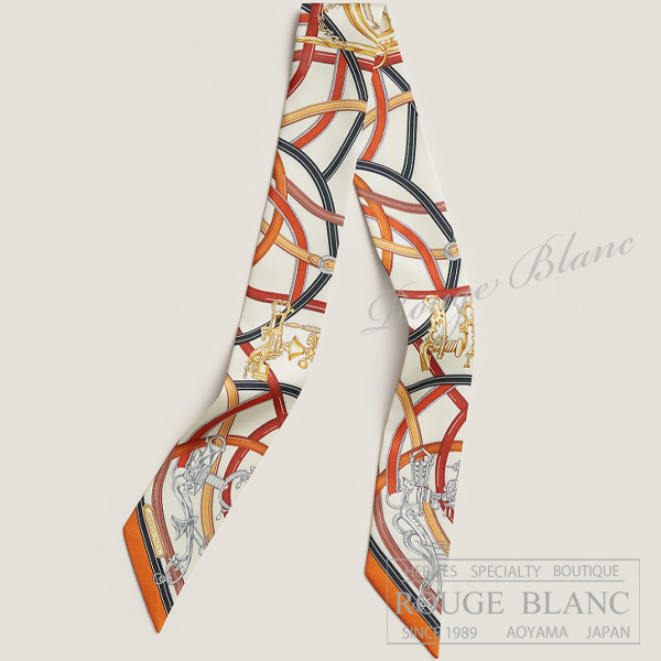 エルメス　ツイリースカーフ　"伝説のハーネス"　ブランカッセ×オランジュキュイ×ノワール　【新品】 HERMES Twilly Scarf  "Harnais Legendaire" Blanc casse×Orange cuit×Noir 【NEW】