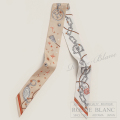 エルメス　ツイリースカーフ　"セ・ラ・フェット"　ベージュロゼ×キャラメル×ブラン　【新品】HERMES Twilly Scarf  "C'est la Fete" Beige rose×caramel×Blanc 【NEW】