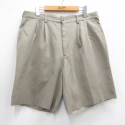 W35★古着 トミーヒルフィガー TOMMY HILFIGER ブランド ショート パンツ ショーツ メンズ ゴルフ ワンポイントロゴ 濃ベージュ カーキ 25may15 中古 ボトムス 短パン ショーパン ハーフ