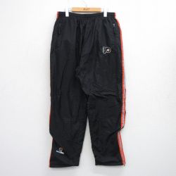 W36★古着 ナイロン パンツ メンズ NHL フィラデルフィアフライヤーズ 黒他 ブラック アイスホッケー 25oct02 中古 ボトムス ロング