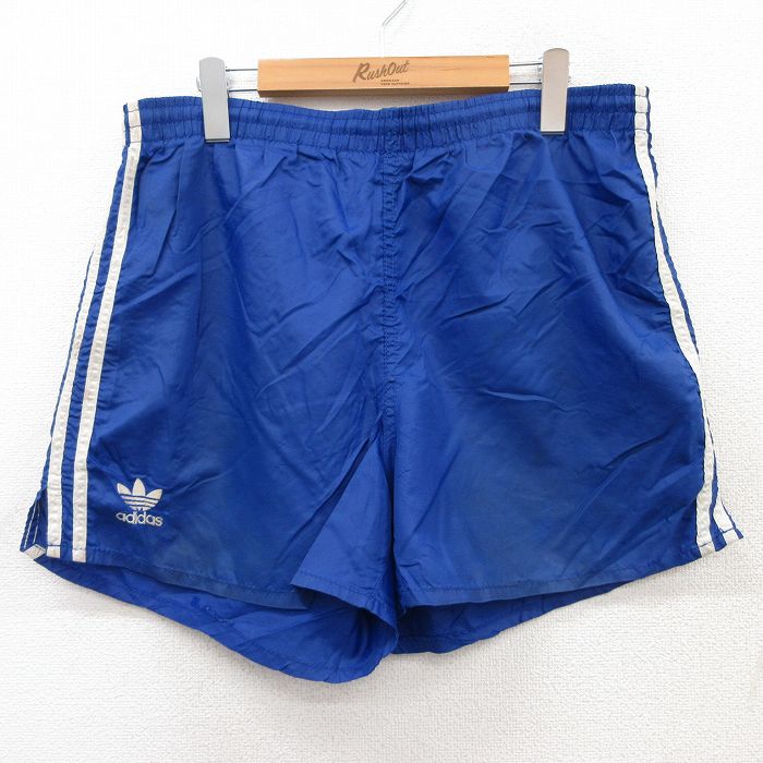 W35★古着 アディダス adidas ショート トレーニング パンツ ショーツ メンズ 90年代 90s ワンポイントロゴ リーフ トレフォイル USA製 青 ブルー 3本ライン 【spe】 25jun18 中古 ボトムス 短パン ショーパン