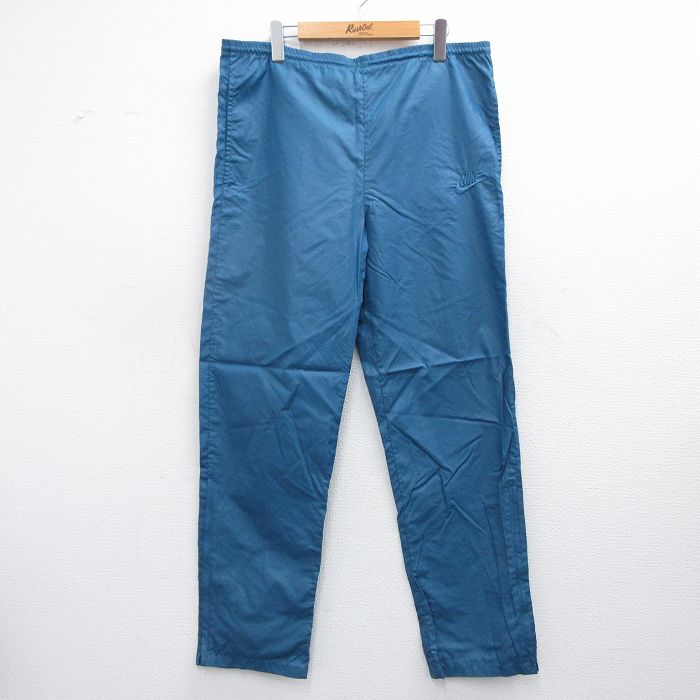 W38★古着 ナイキ NIKE ナイロン パンツ メンズ 80年代 80s ワンポイントロゴ 青緑 【spe】 25feb19 中古 ボトムス ロング