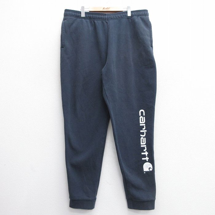 W41★古着 カーハート Carhartt スウェット パンツ メンズ ビッグロゴ 紺 ネイビー 25mar27 中古 ボトムス ロング