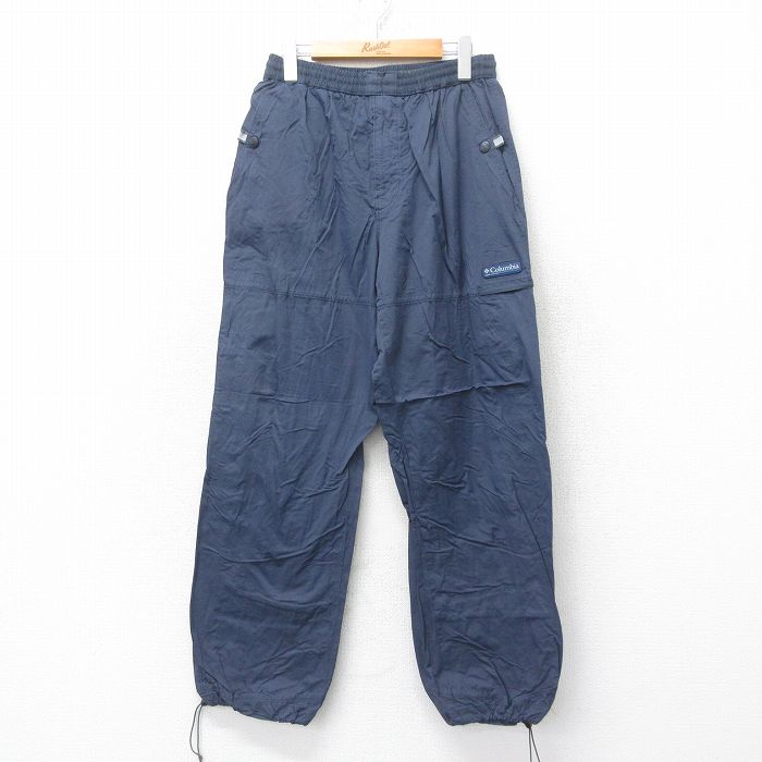 W31★古着 コロンビア COLUMBIA ナイロン パンツ メンズ 00年代 00s ワンポイントロゴ 紺 ネイビー 25jul14 中古 ボトムス ロング