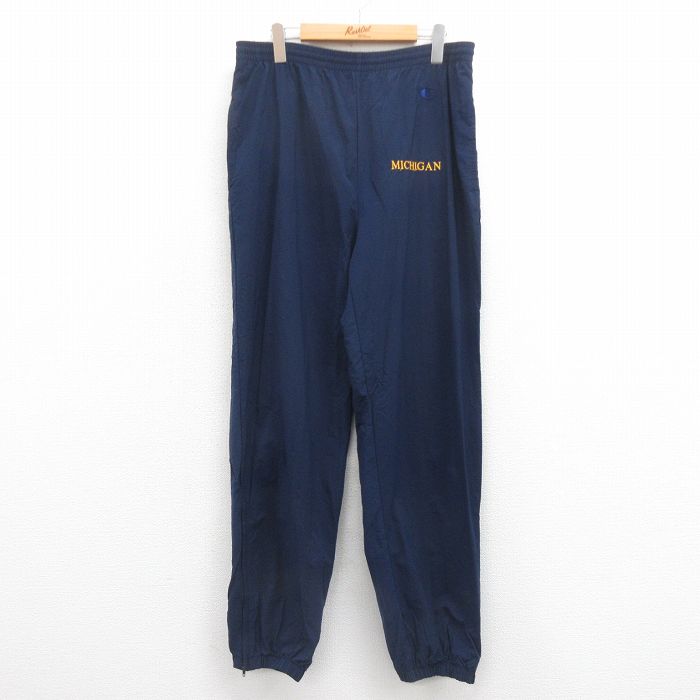 W31★古着 チャンピオン Champion ナイロン パンツ メンズ 90年代 90s ミシガン 紺 ネイビー 25aug06 中古 ボトムス ロング