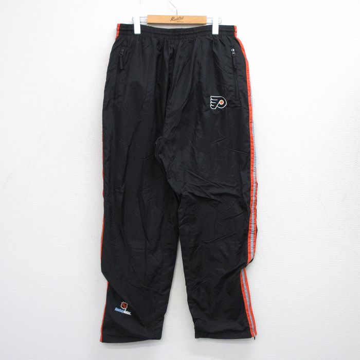 W36★古着 ナイロン パンツ メンズ NHL フィラデルフィアフライヤーズ 黒他 ブラック アイスホッケー 25oct02 中古 ボトムス ロング