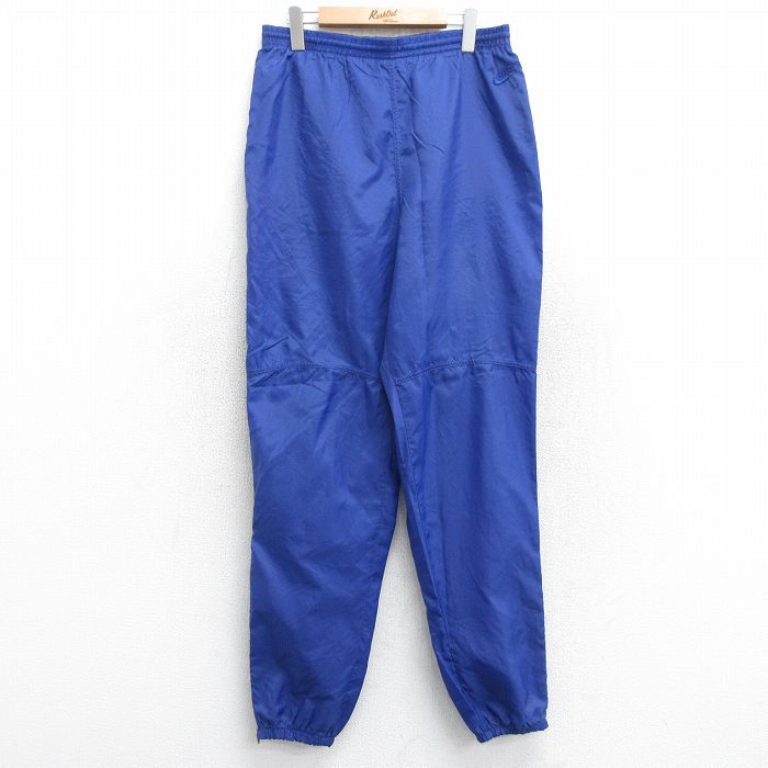 W34★古着 ナイキ NIKE ナイロン パンツ メンズ 90年代 90s ワンポイントロゴ 青 ブルー 25oct28 中古 ボトムス ロング