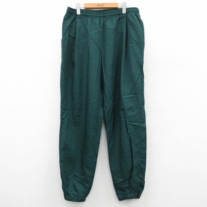 W34★古着 ナイキ NIKE ナイロン パンツ メンズ 00年代 00s ワンポイントロゴ 緑 26feb09