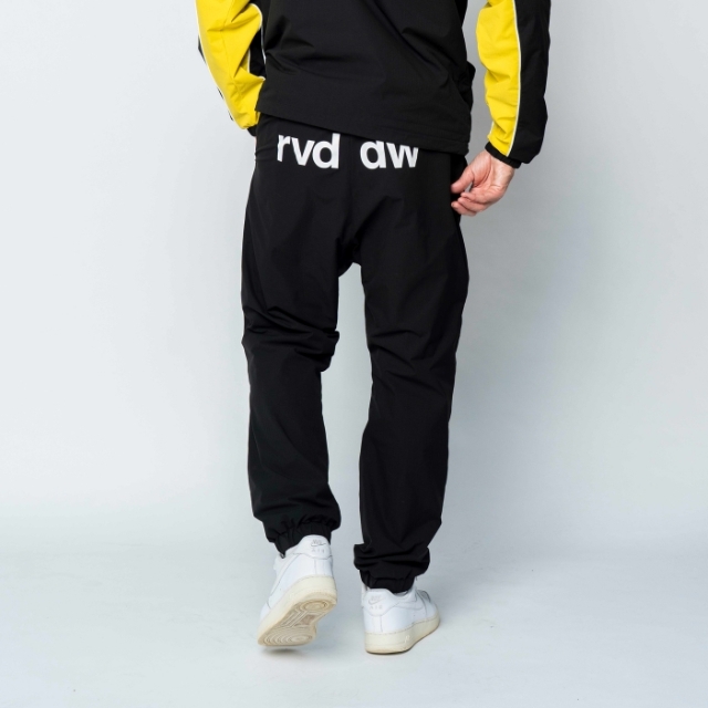rvddw ウォームアップウェア ブラック/イエロー新品未使用 COLOR BLOCK BACKYARD PANTS rvddw ONLINE STORE