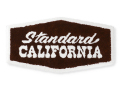 【送料無料】STANDARD CALIFORNIA STADIUM LOGO RUG BROWN