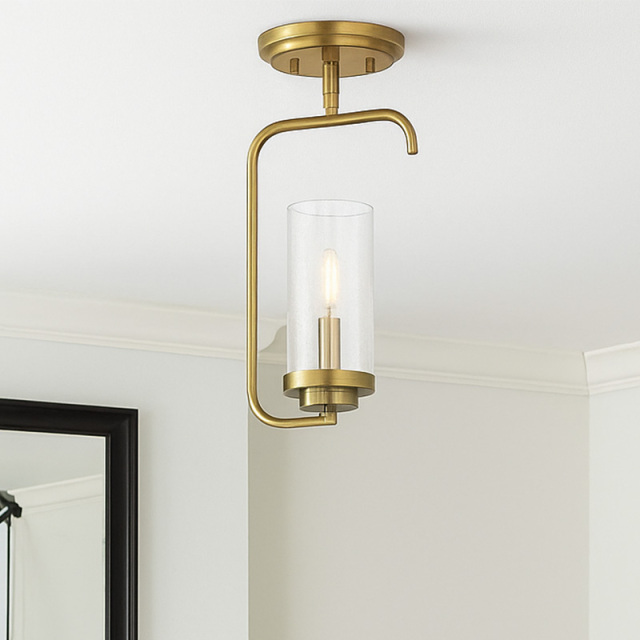 細身フレームとガラスシェードが印象的な室内用天井ライトの設置例