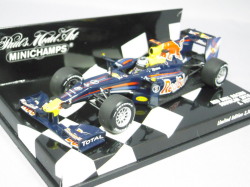 ・ミニチャンプス 1/43 レッドブル ショーカー 2010 ベッテル