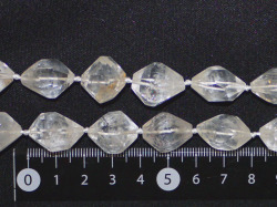 ホーランダイト・イン・クオーツ　タンブル型　約18ミリ