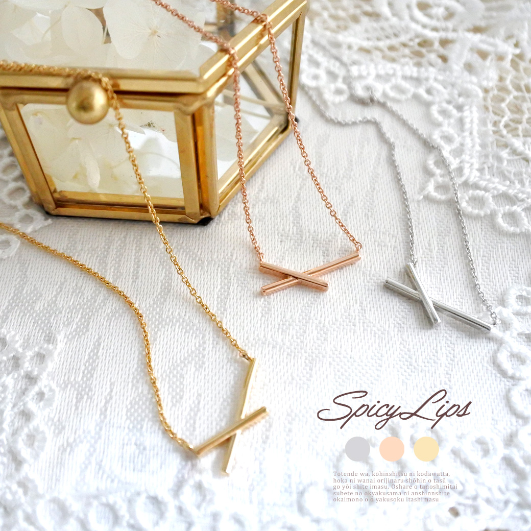 毎日使いできるシンプル ネックレス 。シャープに交差するようなメタルデザイン 0918