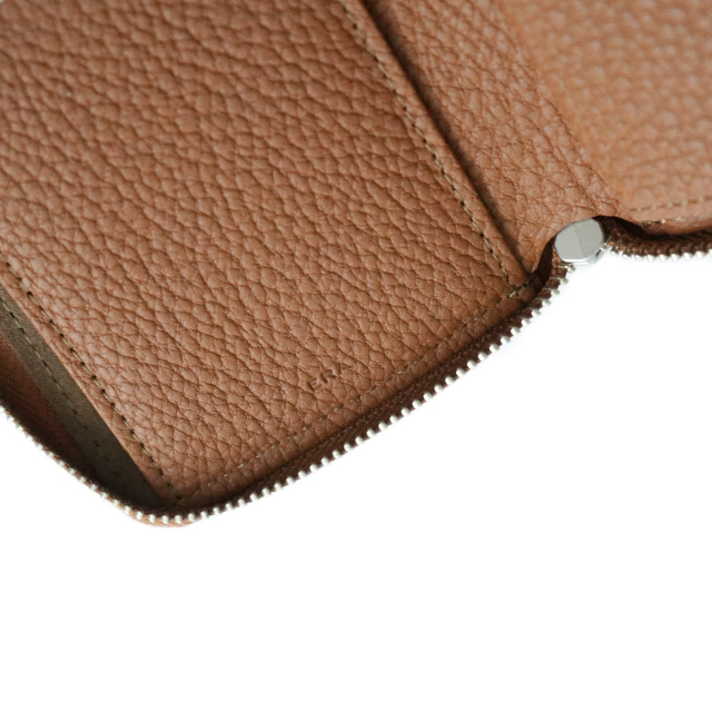 ERA. CRISPANIL ROUND PALM WALLET