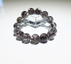 RE0567 ブラックルチルクォーツSAup 14．2mm～15mm