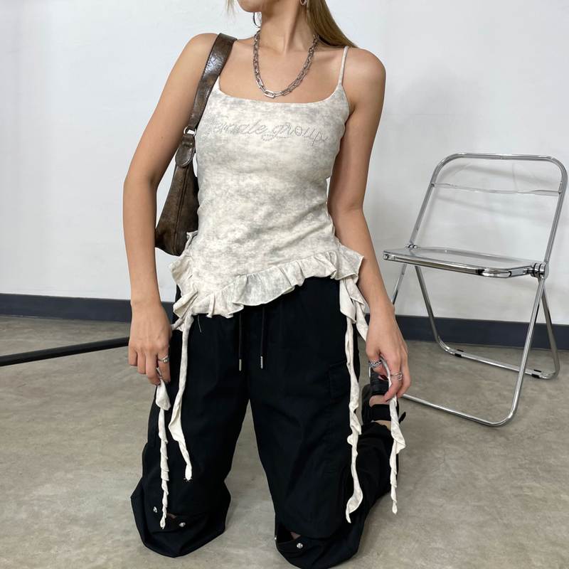 ストーンロゴアシメトップス