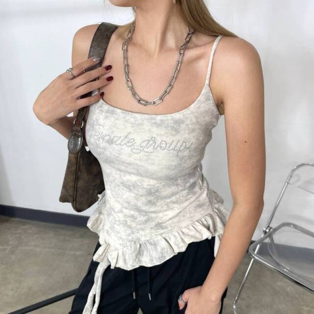 ストーンロゴアシメトップス