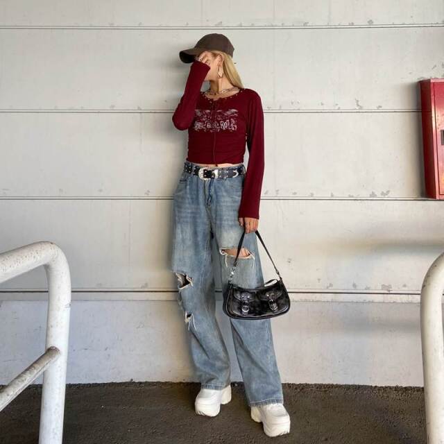 リベットモチーフロゴレースアップトップス