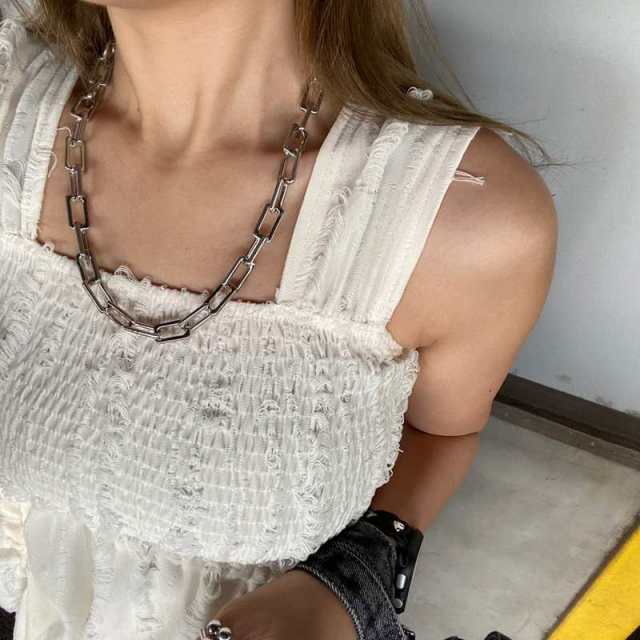 ダメージドロストノースリーブトップス