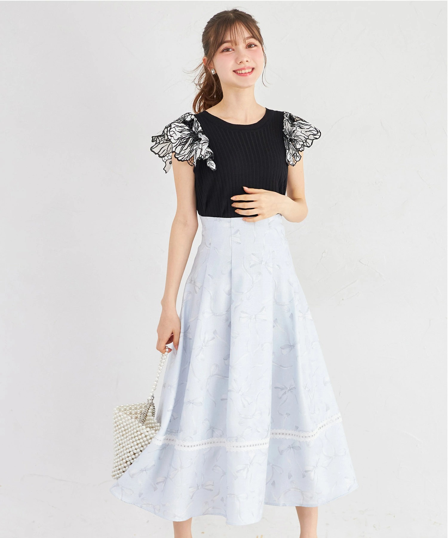バックレースアップ裾レース装飾リボンプリントツイードライクフレアスカート tocco closet(トッコクローゼット) ＊スペシャルプライス品につき返品/キャンセル/配送日指定不可/ラッピング不可/少量在庫のセールの為交換は出来かねる場合がございます。
