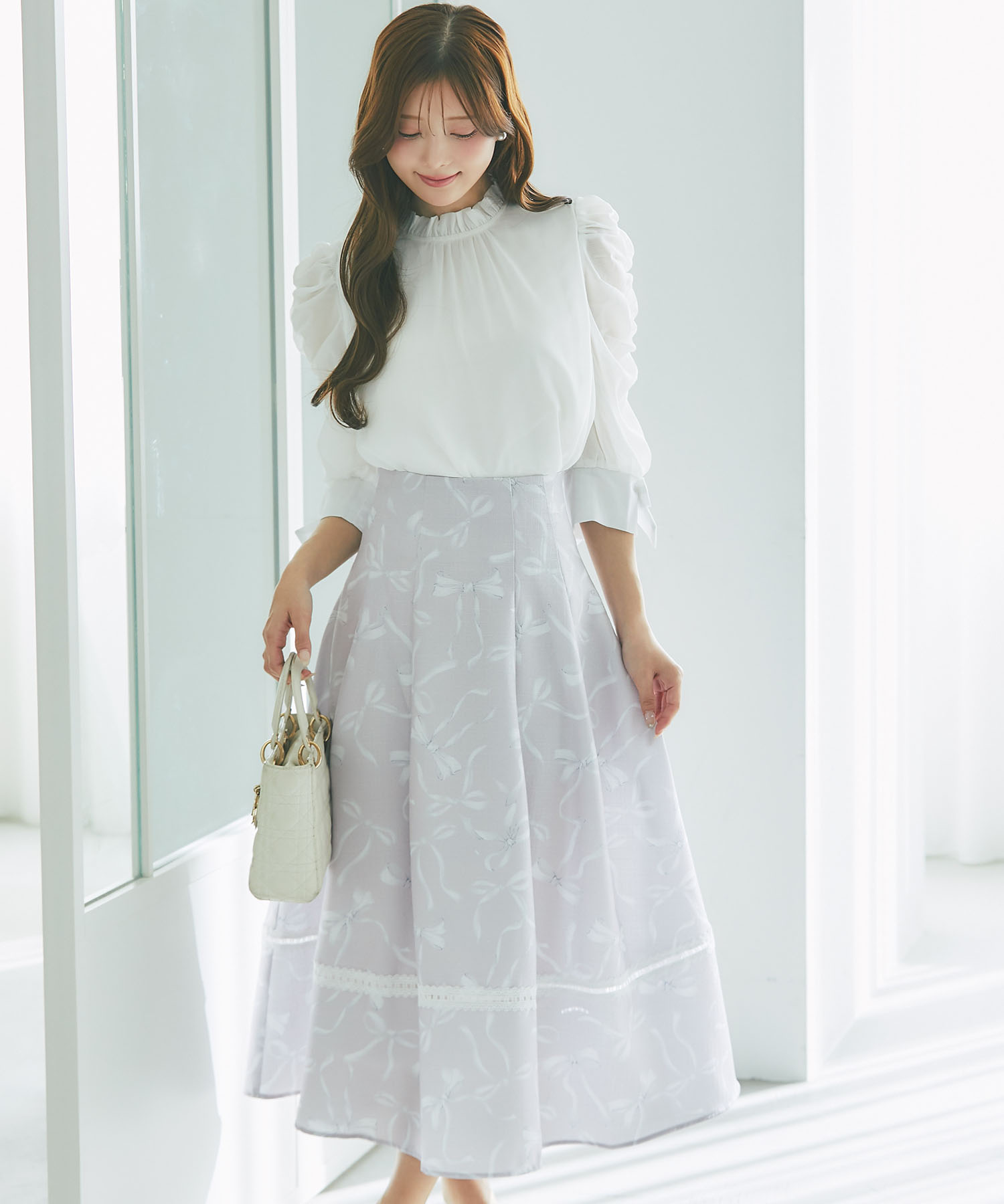 バックレースアップ裾レース装飾リボンプリントツイードライクフレアスカート tocco closet(トッコクローゼット)《RibbonCollection》※松川星さんはピンク着用