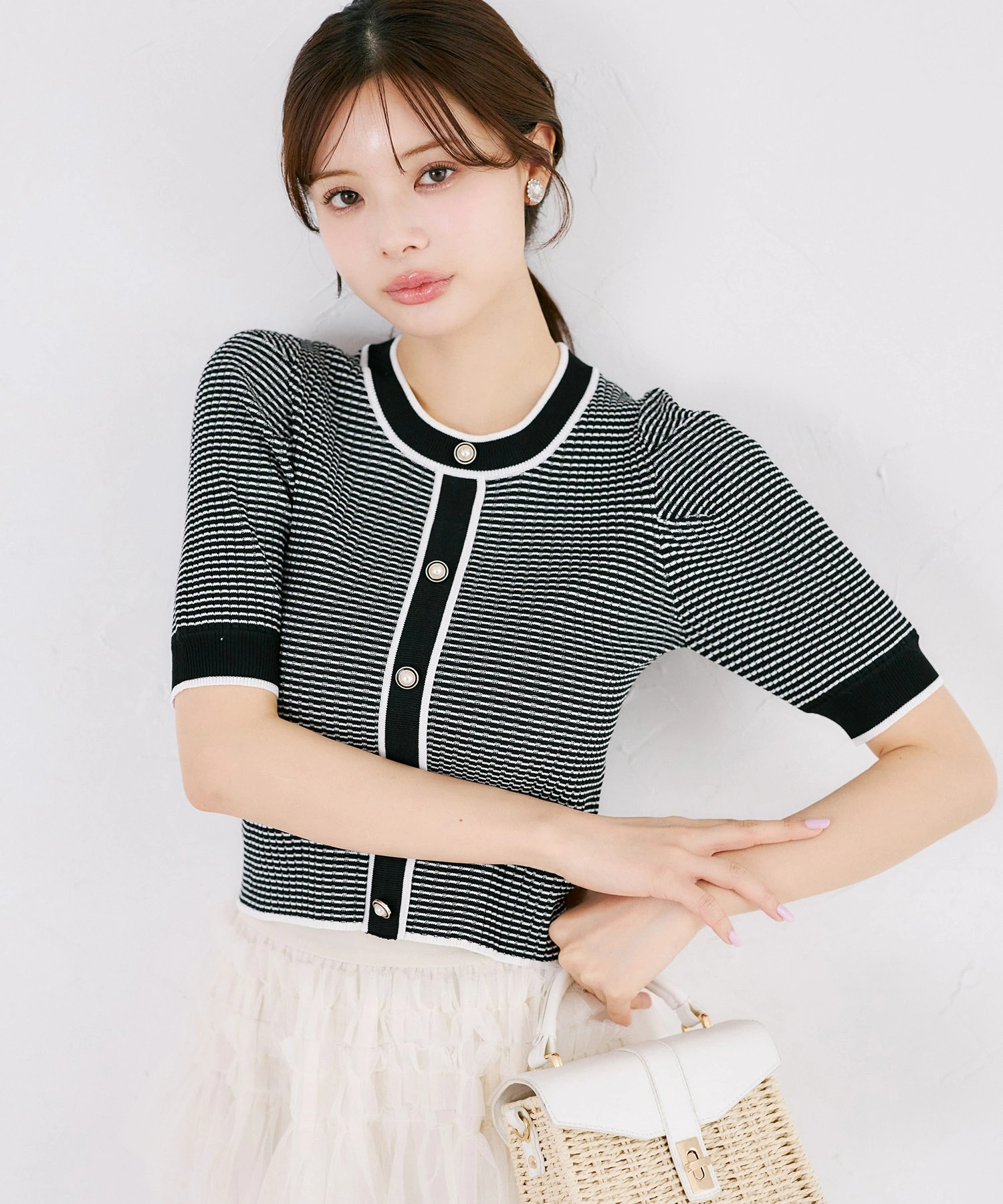 パール飾り釦付き配色リブニットプルオーバー tocco closet(トッコクローゼット)