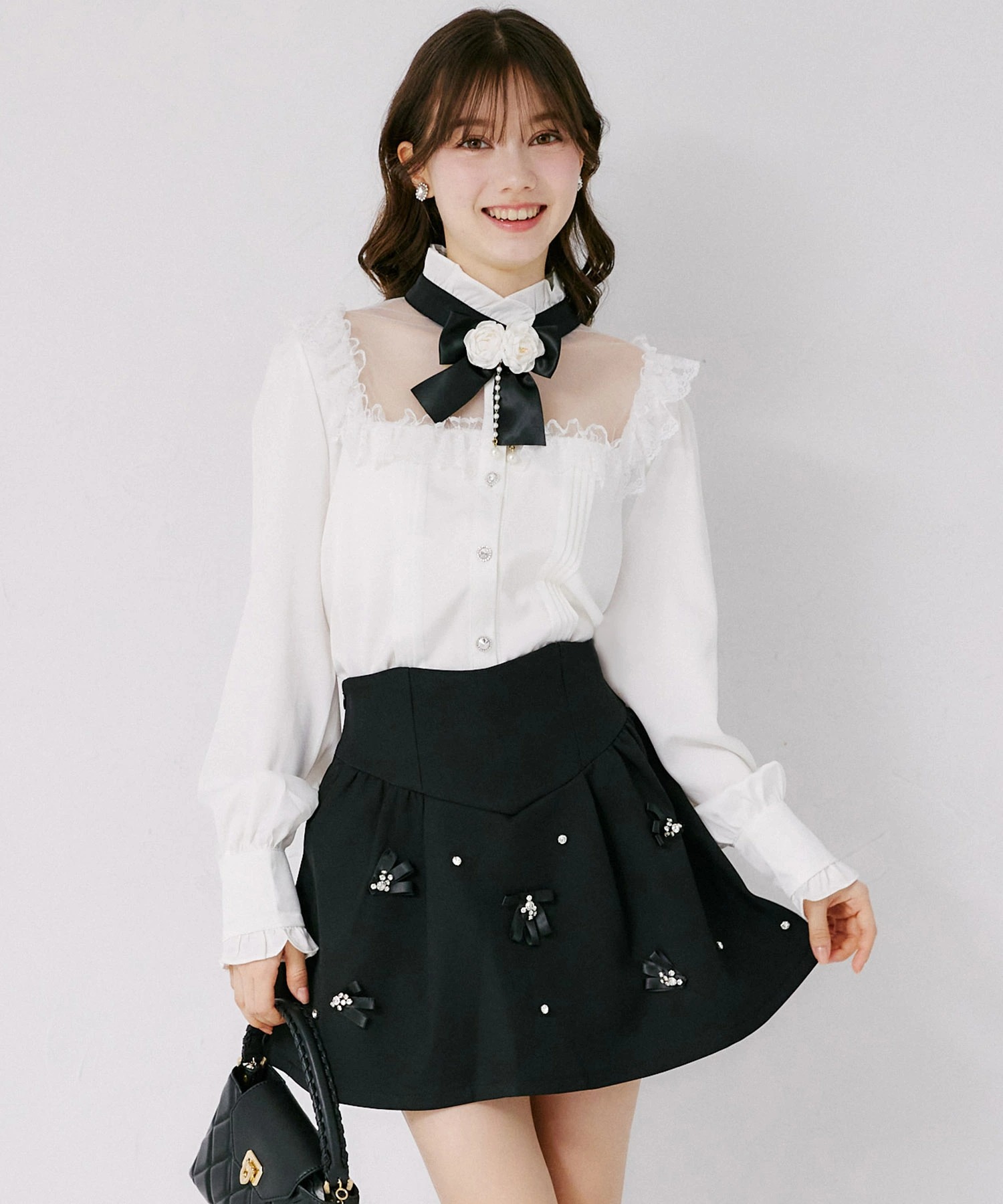 tocco トッコクローゼット　ビジュー＆リボン付きインナーパンツ仕様ミニスカート 