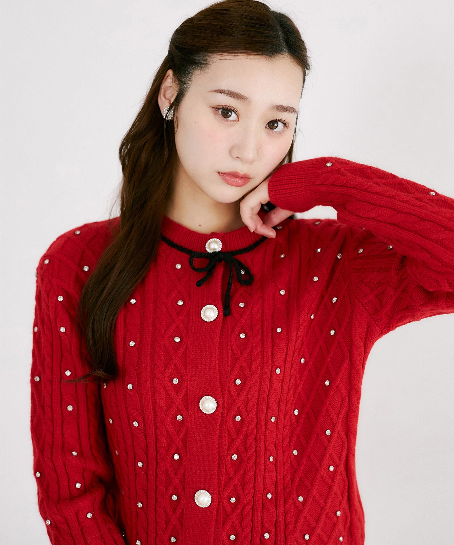 リボン＆ビジュー付きパール釦ケーブル編みニットカーディガン tocco closet(トッコクローゼット)