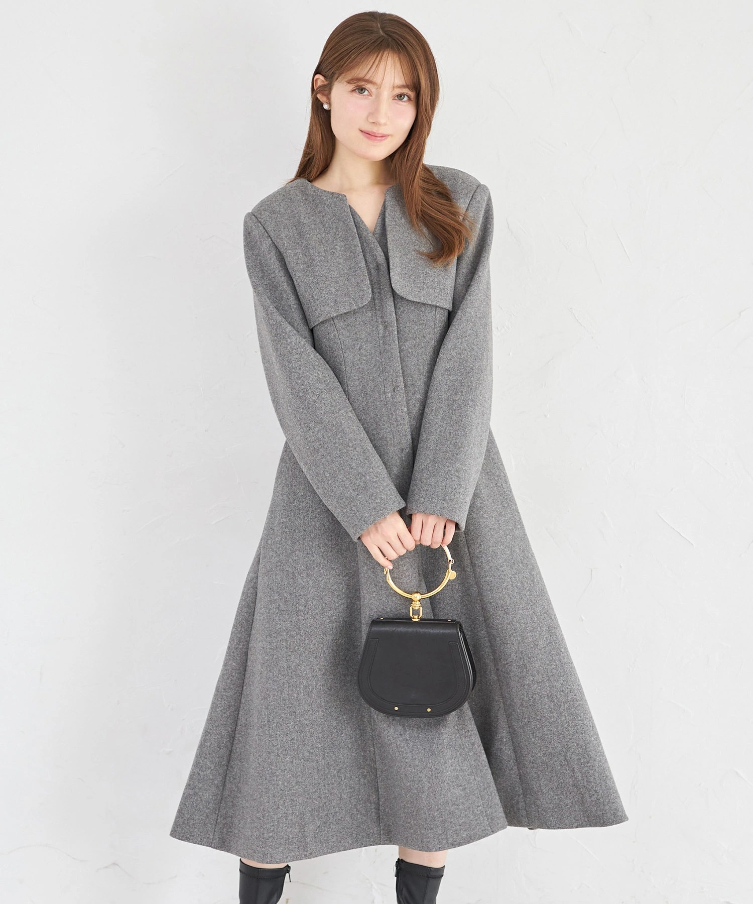 レイヤード風ヨーク切り替えフレアコート tocco closet(トッコクローゼット)※オフィシャルサイト限定 ※セレクトアイテム