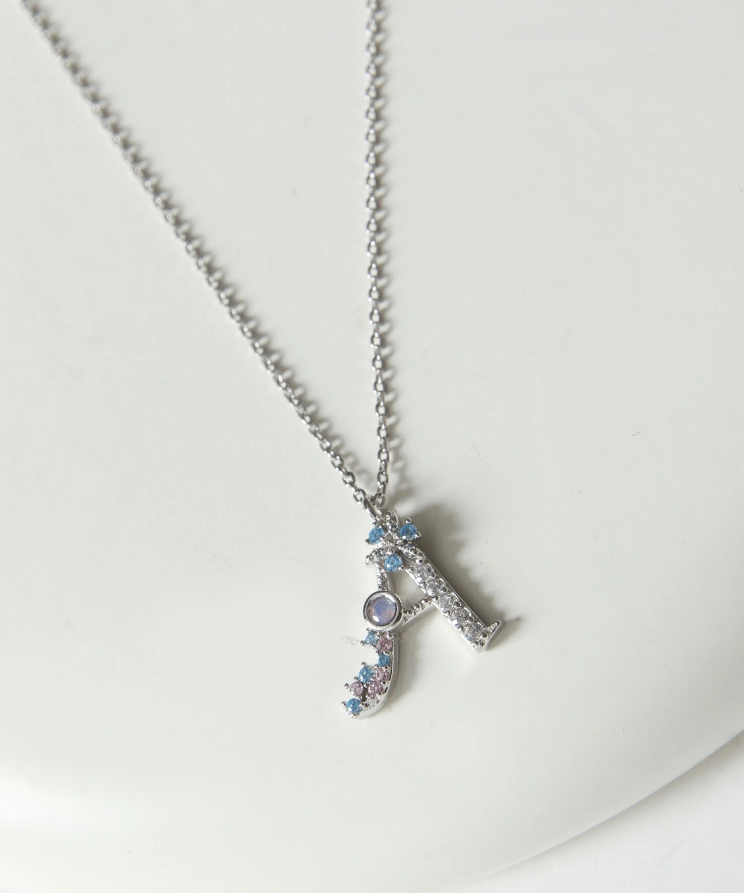 tocco トッコクローゼット　
カラービジューイニシャルネックレス