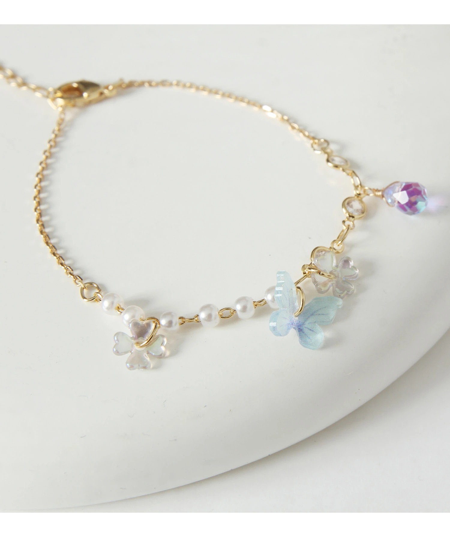 tocco トッコクローゼット　
パピヨン＆フラワーモチーフ付きパールビジューブレスレット