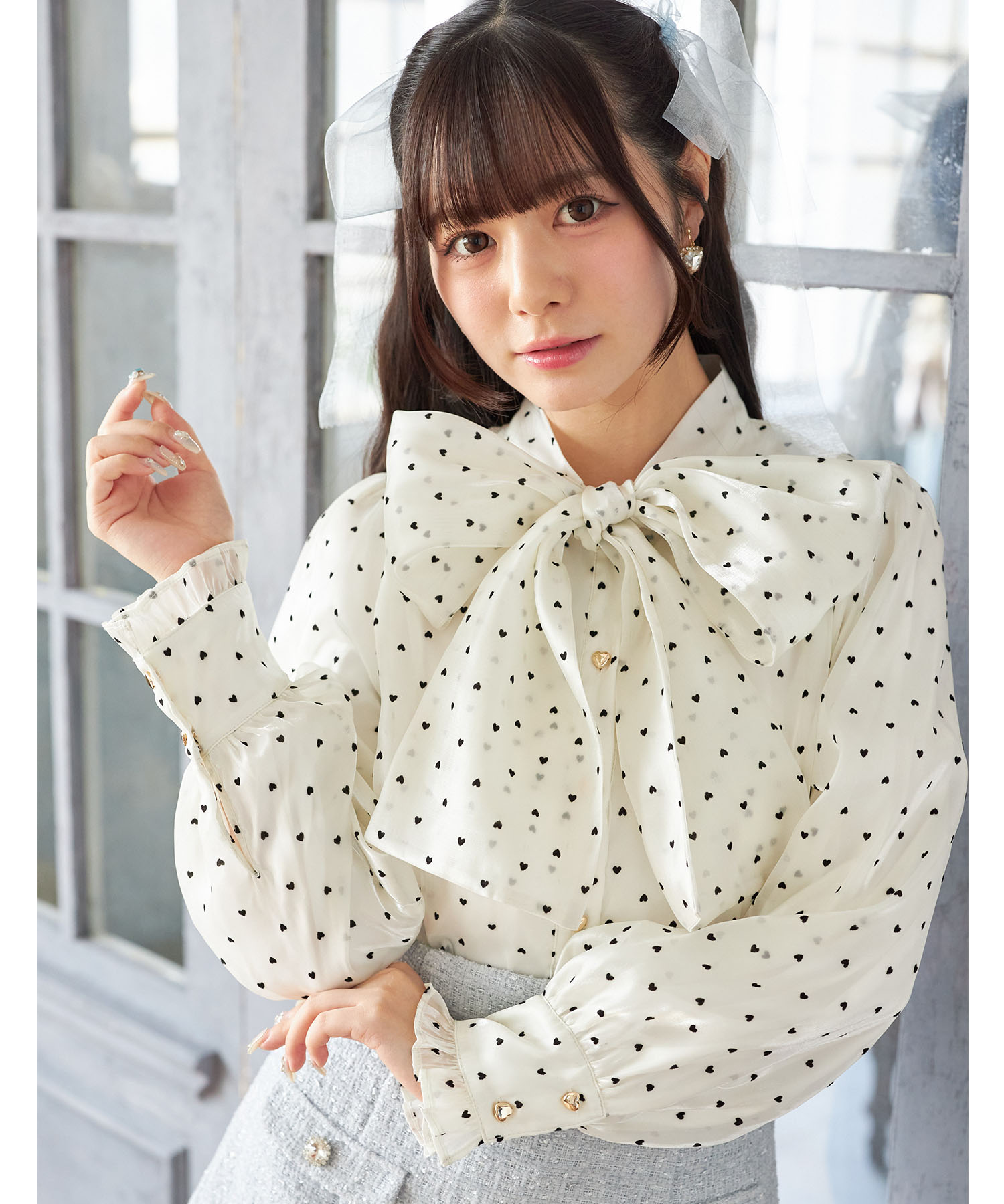 ハート釦ボウタイリボン付きハートフロッキーブラウス   1月17日(土)再販決定☆ Suyunn(スユン) ※少量の在庫確保による再販売の為、交換は出来かねる場合がございます。