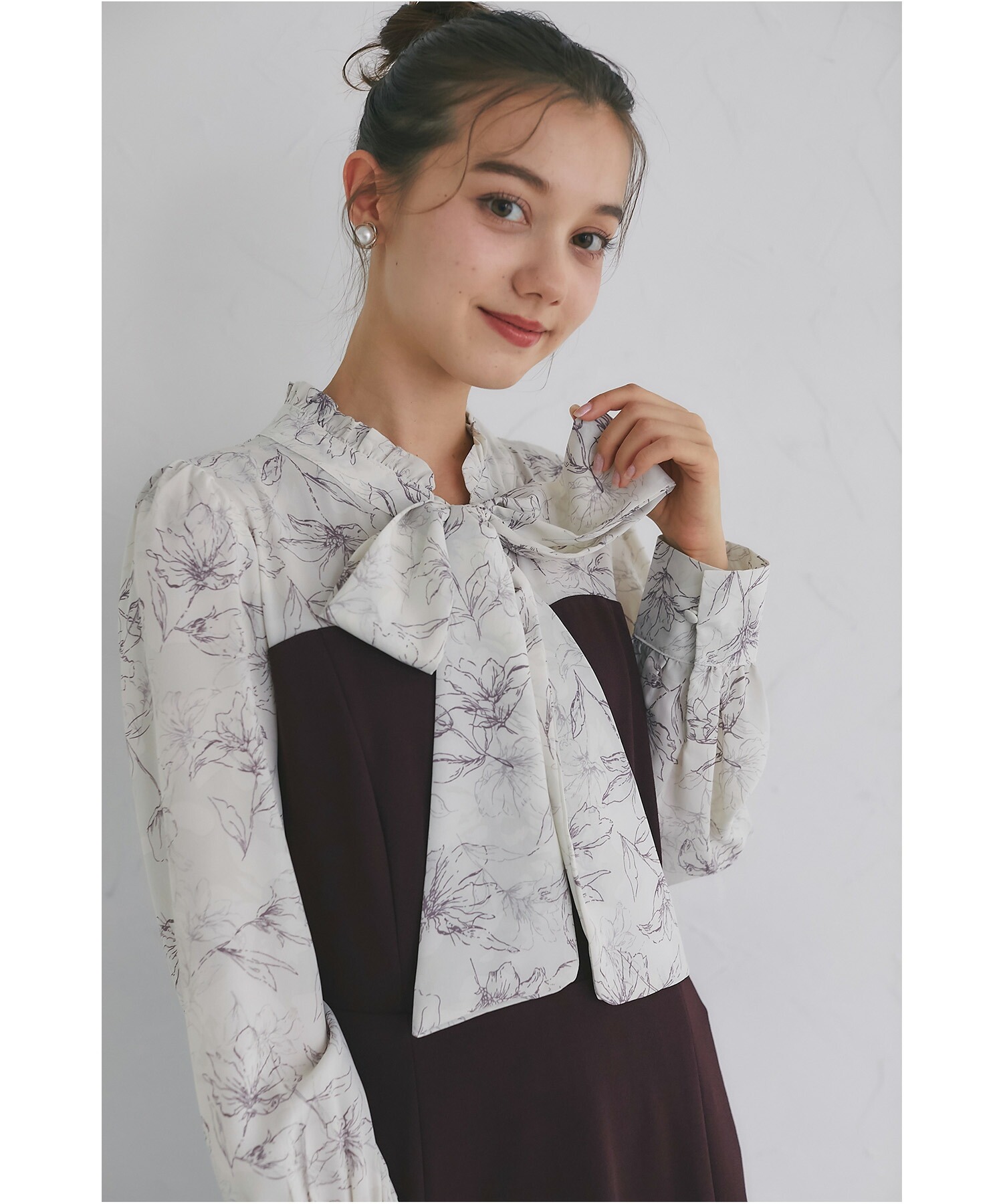 ボウタイリボンフラワープリントドッキングワンピース【jenive】tocco closet(トッコクローゼット)　＊スペシャルプライス品につき返品/キャンセル/配送日指定不可/ラッピング不可/少量在庫のセールの為交換は出来かねる場合がございます。