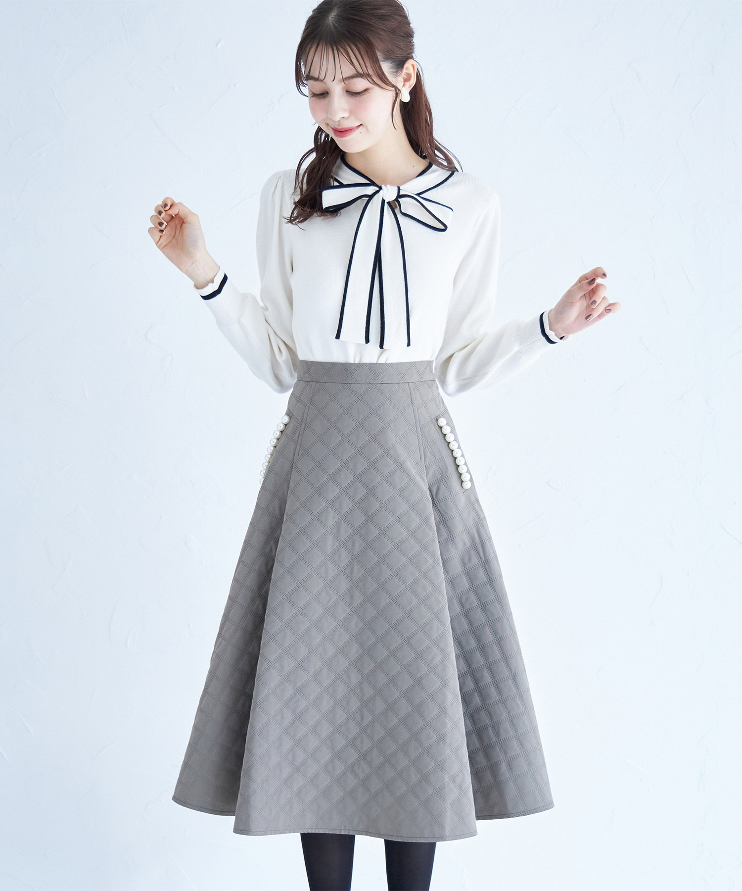 tocco トッコクローゼット　ひと目で美人なポケットパール付きエンボスキルティングタックフレアスカート