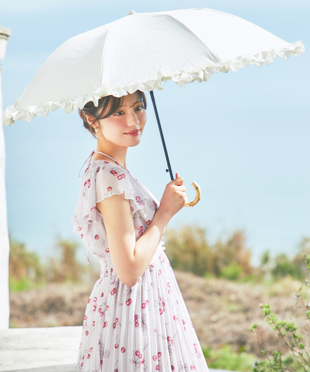 1月16日まで値下げ チェックリボン肩空きプリーツワンピース ピンク パール付きチェリー×リボンプリントネックリボンプリーツワンピース