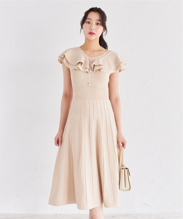tocco ケープ風ラッフルフリルリブニットワンピース　新品 tocco ケープ風ラッフルフリルリブニットワンピース 新品 - メルカリ