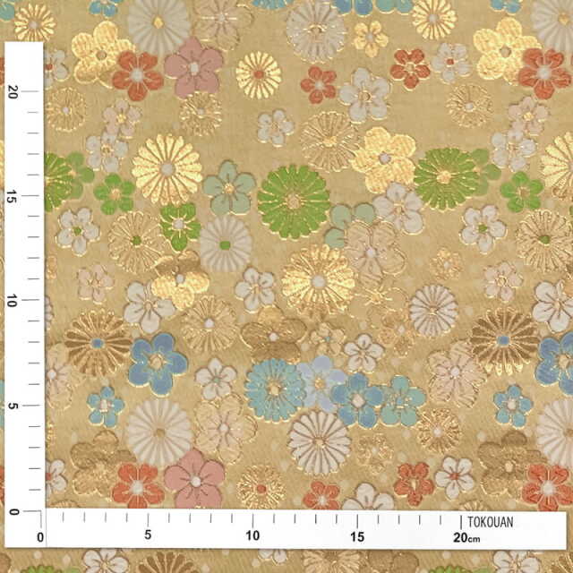 金襴生地 菊梅花丸文 (桑染) 柄の和柄生地通販なら都香庵