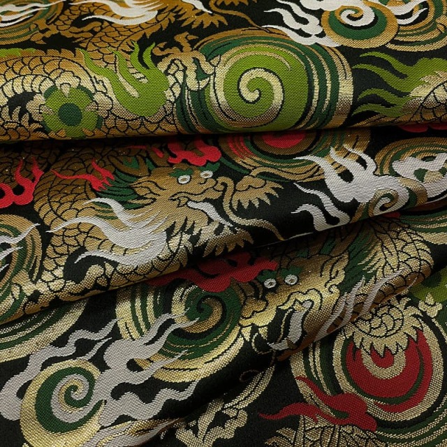 金襴生地通販渦巻きに火炎龍（黒）柄 和風 生地販売なら都香庵
