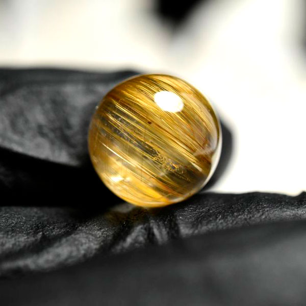 ルチルクォーツ　ゴールドルチル　丸玉　球　置物　金運　商売繁盛　針水晶　パワーストーン