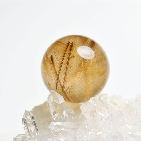 ゴールドルチルクォーツ 丸玉 置物｜株式会社オンビル 