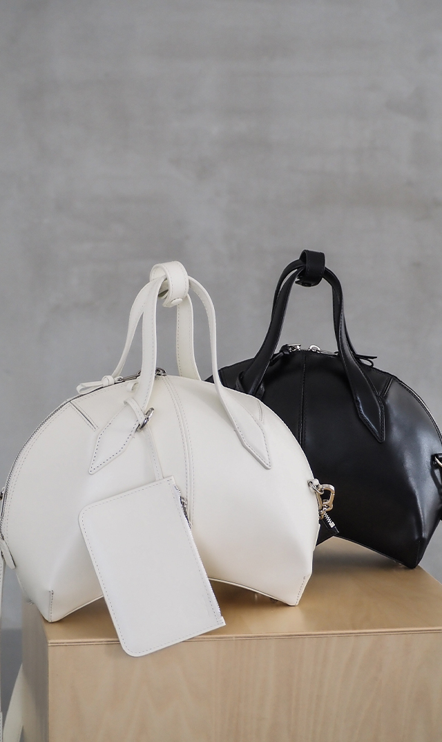 インポートボクギ曲線美ハンドバッグ黒白