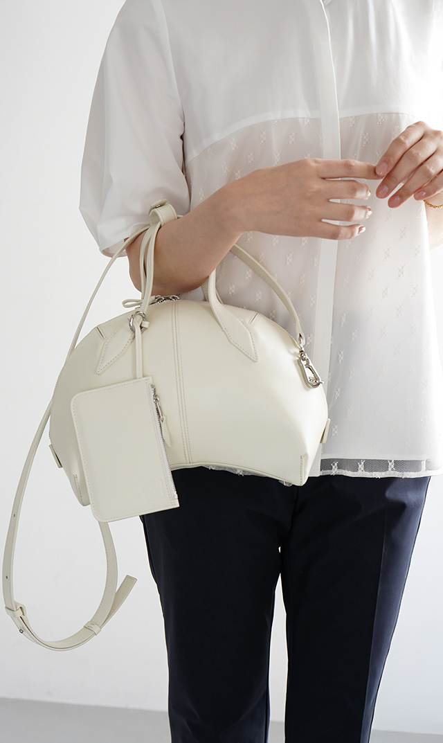 インポートボクギ曲線美ハンドバッグ黒白