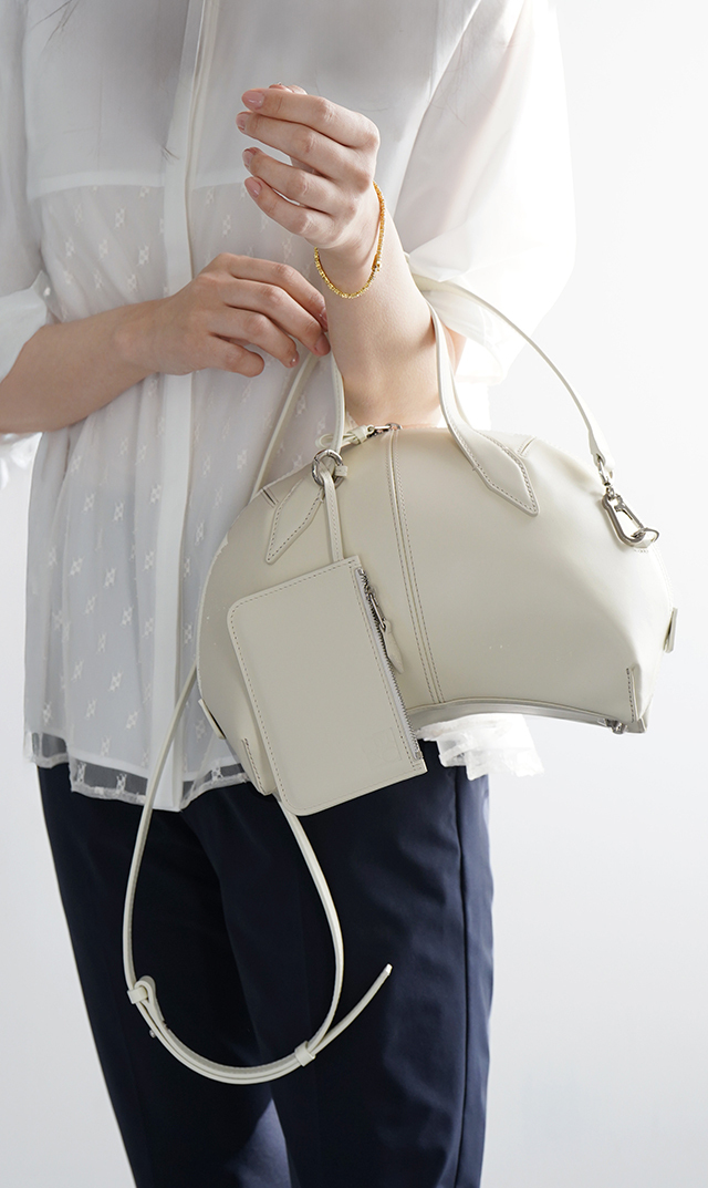 インポートボクギ曲線美ハンドバッグ黒白