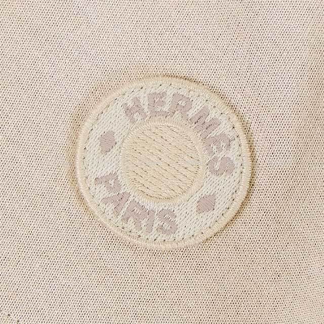 エルメス セリエボタン ニット ベージュ HERMES(エルメス) セリエボタン シルク カー プリント柄
