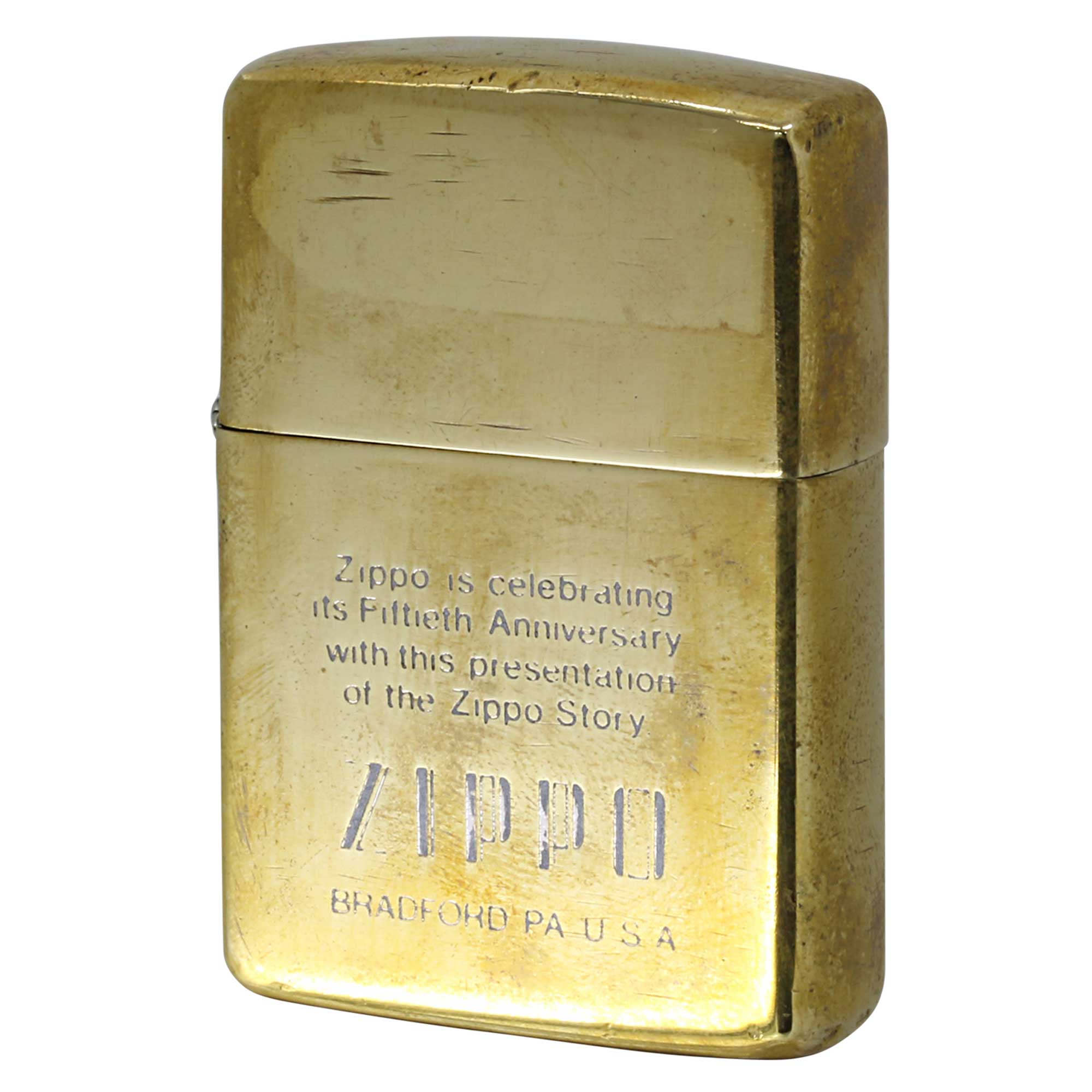 絶版/ヴィンテージ Zippo ジッポー 中古 1989年製造 創業50周年記念 ZIPPO STORY 金メッキ  [C]使用感あり傷汚れあり